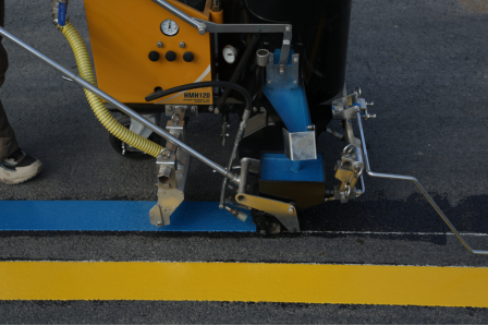 Hand‑held operation of small‑scale marking equipment